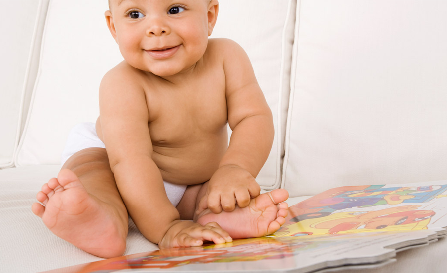 Baby with Cardboard Book with Rounded Edges